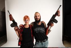 COUPLES5-TOMMYGUNS-NEUTRAL-POSE