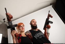 COUPLES5-TOMMYGUNS-NEUTRAL-POSE