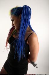 dolores-uzi-shotgun-crossed-behind-back