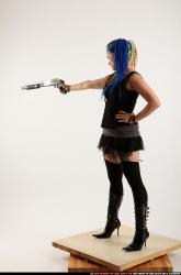 dolores-shotgun-aiming