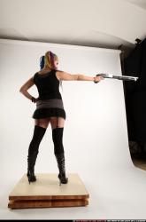 dolores-shotgun-aiming