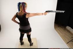 dolores-shotgun-aiming