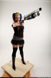 dolores-shotgun-aiming