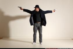Man Adult Muscular White Fighting with gun Standing poses Coat