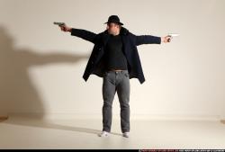 Man Adult Muscular White Fighting with gun Standing poses Coat