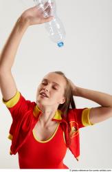MARTINA BAYWATCH KNEELING POSE WITH BOTTLE