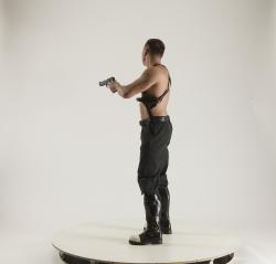MICHAEL STANDING POSE WITH GUNS