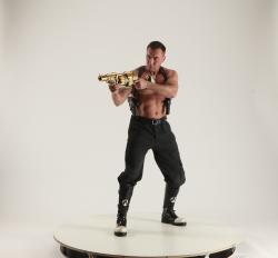 MICHAEL STANDING POSE WITH BIG GUN