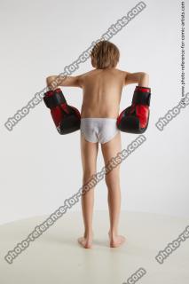 standing young boy with box gloves novel 05