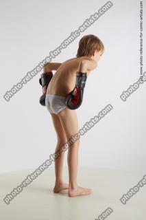 standing young boy with box gloves novel 06