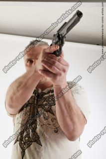 man fighting with gun yury 09