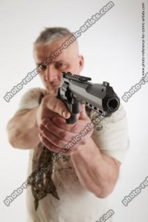 man fighting with gun yury 11