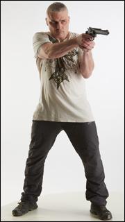 Fighting man with gun Yury