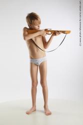 Standing boy with crossbow Novel