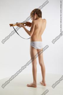 standing young boy with crossbow novel 05