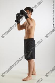standing man with box gloves yoshinaga kuri 02