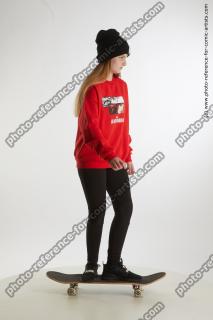 Teenage girl Selin standing on skaterineboard