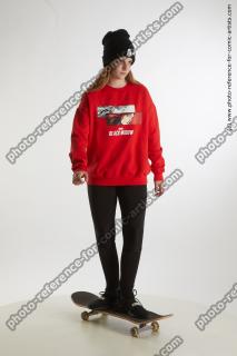 standing teenage girl on skateboard 08