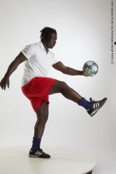 Soccer player with ball Kato Abimbo