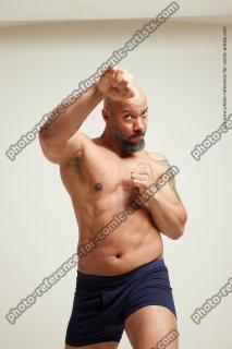 punching strong man ron 82