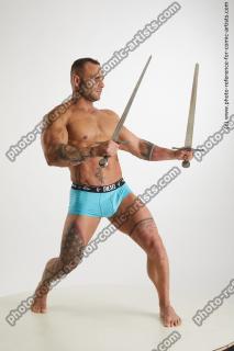 fighting man with swords garrott 08