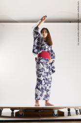 Woman Young Athletic Standing poses Asian Costumes