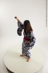 Woman Young Athletic Standing poses Asian Costumes