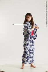 Woman Young Athletic Fighting with sword Standing poses Asian Costumes
