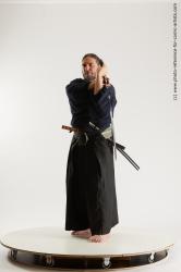 Man Adult Average White Fighting with sword Standing poses Costumes