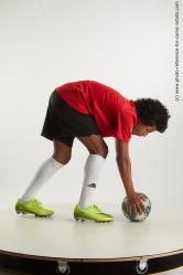 Soccer player with ball Dejavee Ford