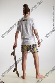 standing man with skateboard nigel 05