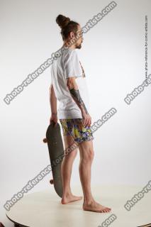 standing man with skateboard nigel 06