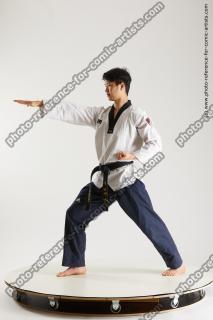 asian man taekwondo poses lan 04b