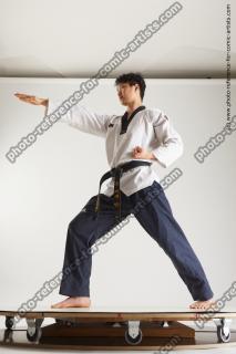 asian man taekwondo poses lan 04c