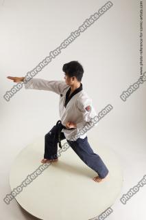 asian man taekwondo poses lan 05a