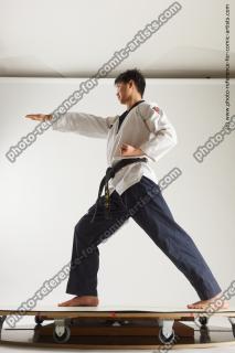 asian man taekwondo poses lan 05c