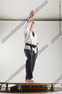 asian man taekwondo poses lan 16c