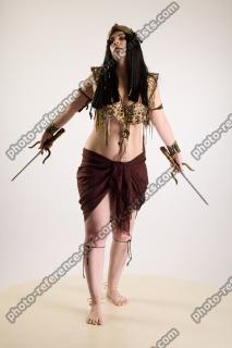 Moira Ancksunamun Standing with Knifes 01