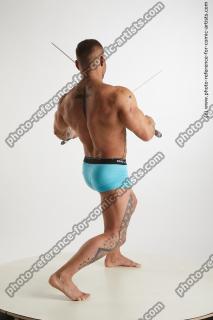 Garrott_Fighting_With_Swords