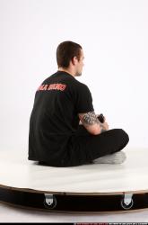 Alex Sitting With Ak-47 Rifle