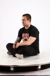 Alex Sitting With Ak-47 Rifle