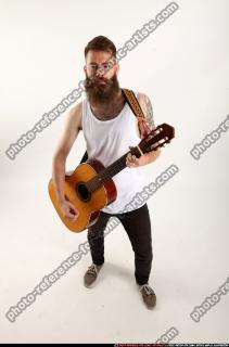 Oscar Playing Guitar