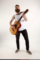 Oscar Playing Guitar