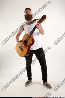 Oscar Playing Guitar