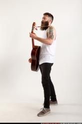 Oscar Playing Guitar