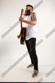 Oscar Playing Guitar