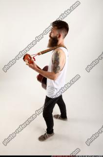 Oscar Playing Guitar