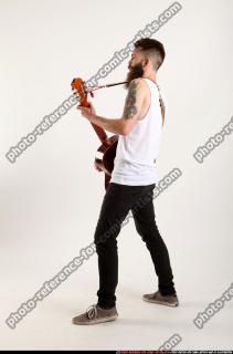 Oscar Playing Guitar