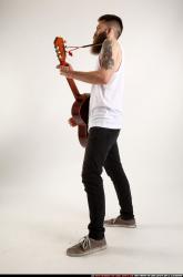 Oscar Playing Guitar