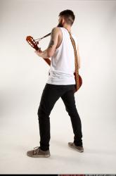 Oscar Playing Guitar